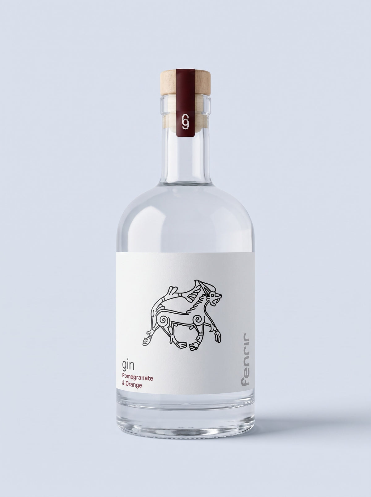 Fenrir Pomegranate & Orange gin, front of the 50 cl bottle with the line-drawn wolf and the flavour printed in oxblood red